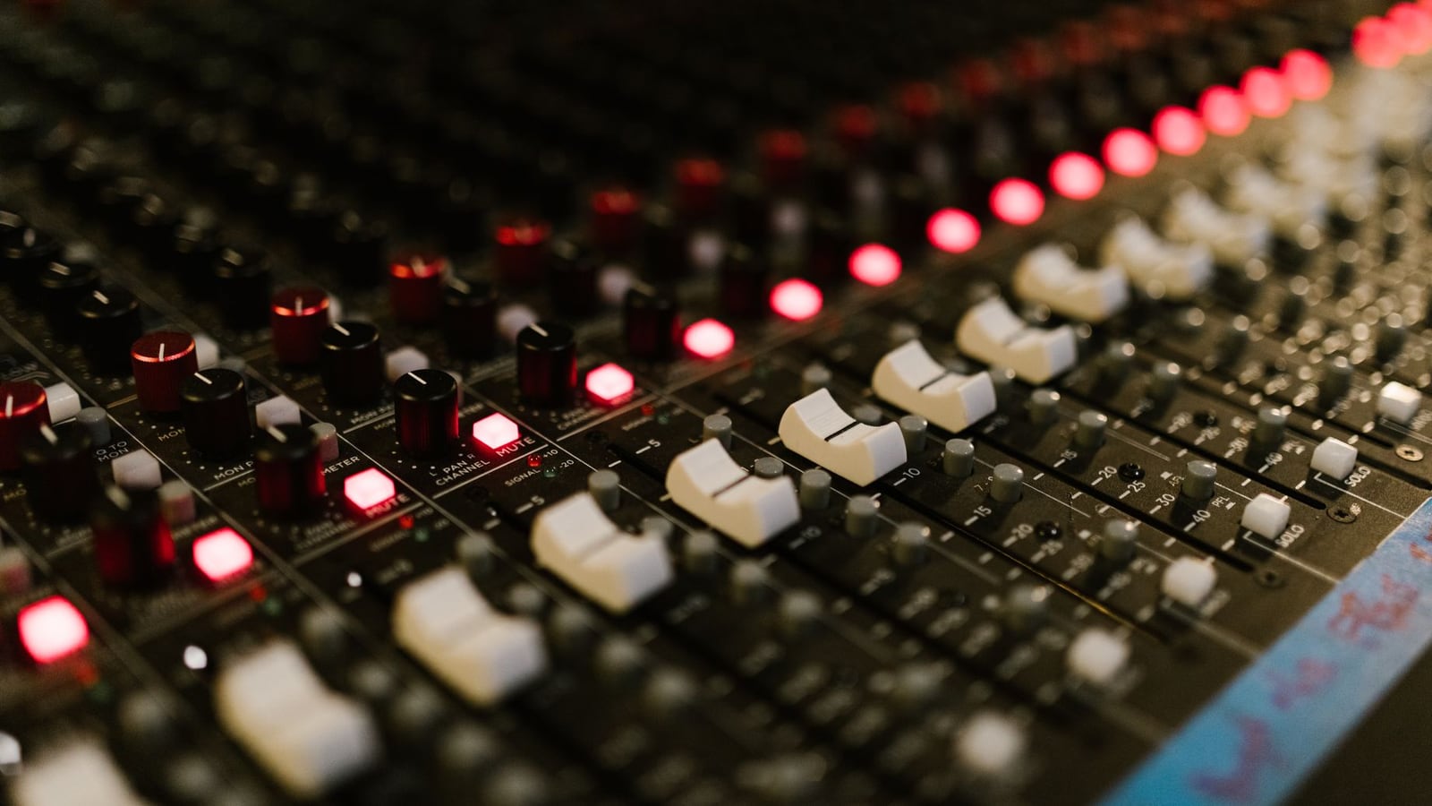 A professional control room at Barecatyra Studio in Salzburg featuring a modern mixing console and acoustic panels